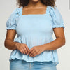 Blue puff sleeve top with a square neckline, a shirred bodice, and a peplum style. This has a very nice stretch to it & is sheer material where it flares out under the bust.